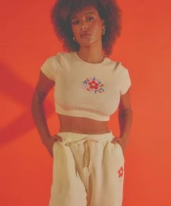 Vacancy Supply X Micke Lindebergh - Blume Baby Tee - Buttercream -Peppermayo cloth-shop 89b0200d3a784d1aab9a6a1d1a10d97e scaled